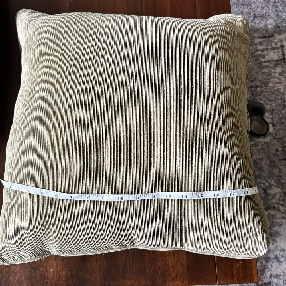 Set of three olive suede throw pillows. Excellent condition.